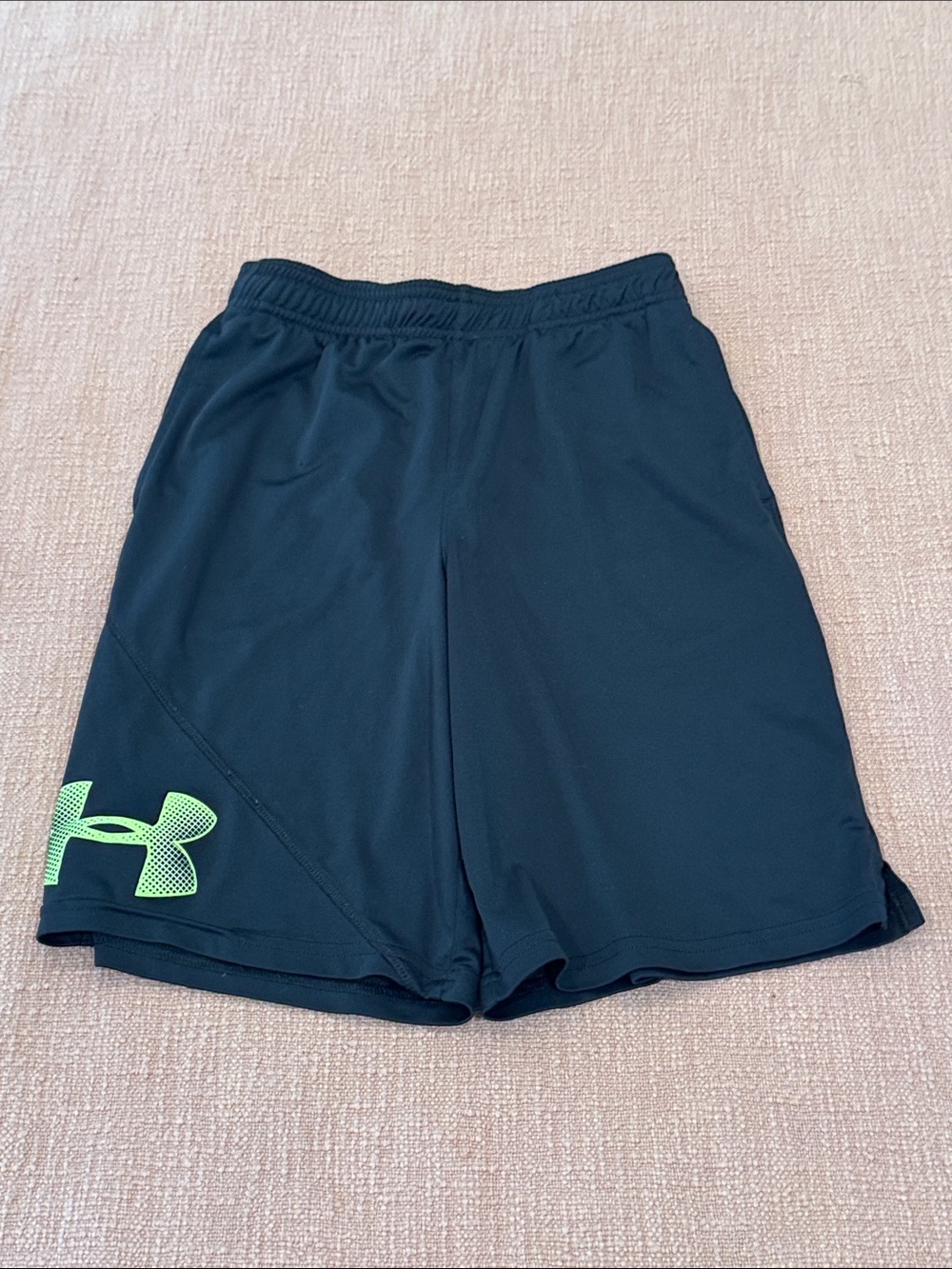Under Armour youth medium Black Athletic Shorts with mesh pockets and drawstring